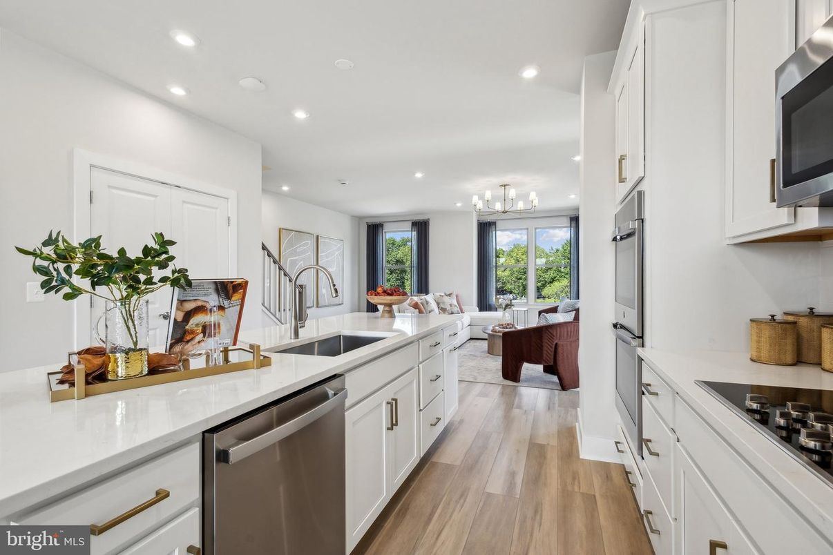 Dining room, Interior, Kitchen, Living room, Recessed Lighting, Stainless Steel Appliances, Wood Texture Flooring