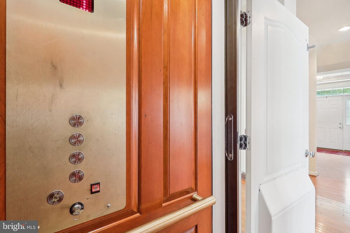 Elevator, Interior, Recessed Lighting, Wood Texture Flooring