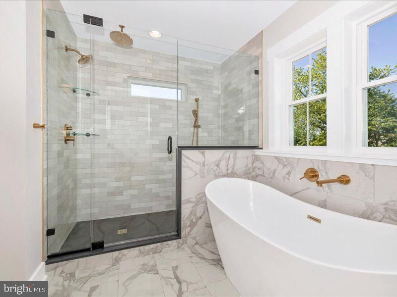 Bathroom, Free Standing Baths, Glass Shower, Interior, Marble, Marble Walls, Recessed Lighting