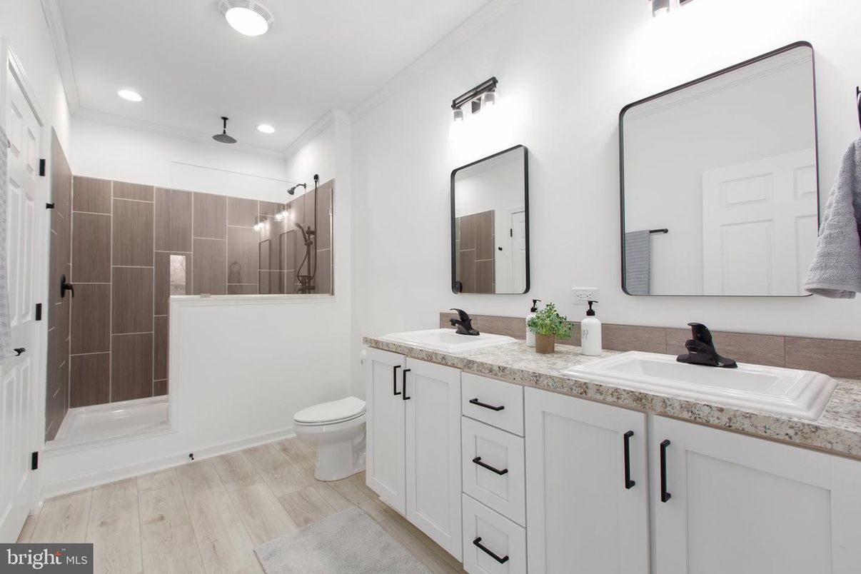 Bathroom, Dual Sink Vanities, Interior, Recessed Lighting, Wood Texture Flooring