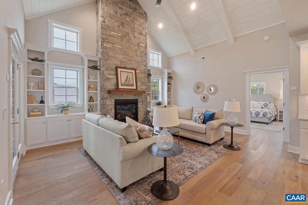 Fireplace, Interior, Living room, Recessed Lighting, Stone Walls, Wood Texture Flooring