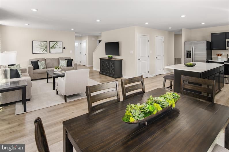 Dining room, Interior, Kitchen, Living room, Recessed Lighting, Stainless Steel Appliances, Wood Texture Flooring