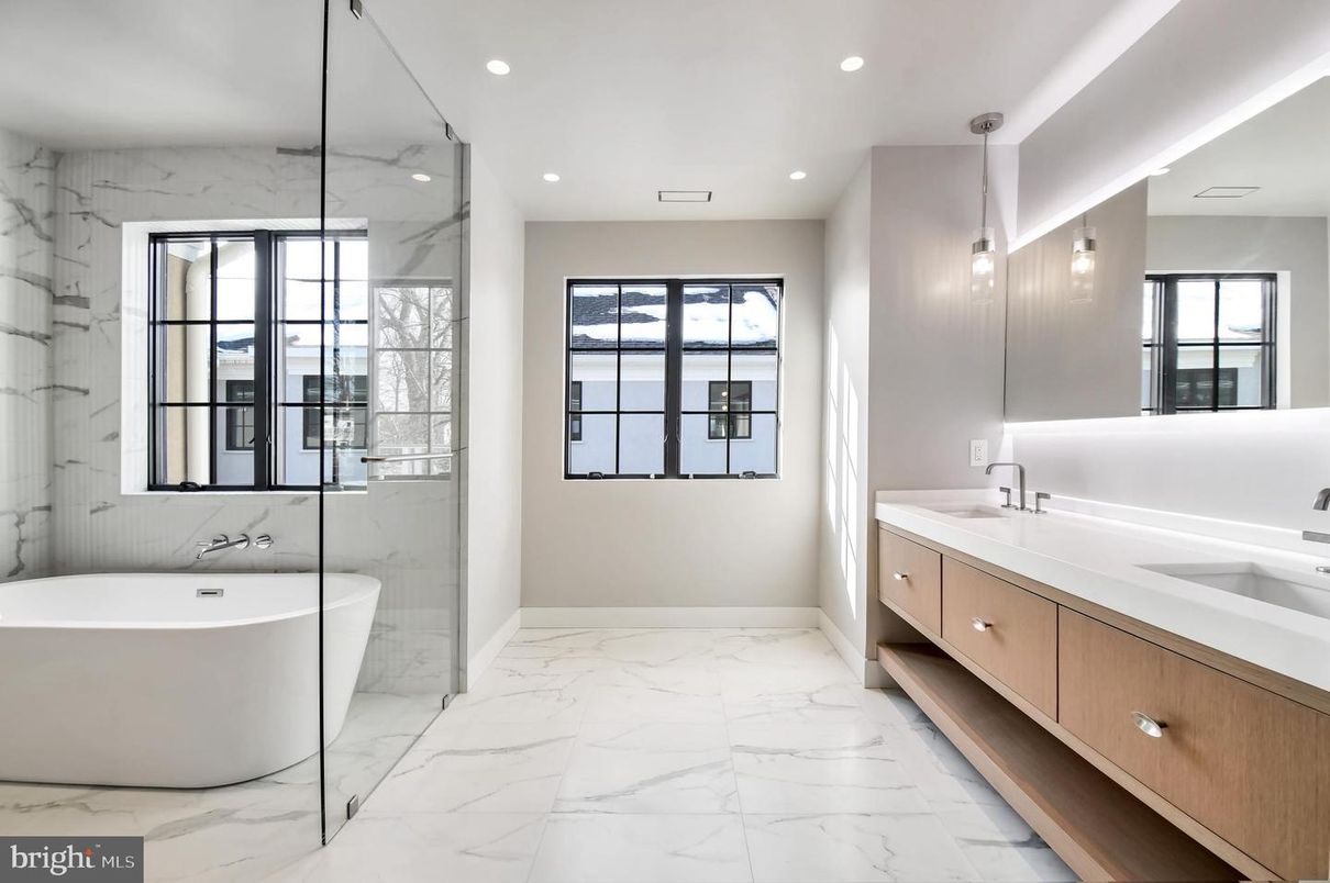 Bathroom, Dual Sink Vanities, Free Standing Baths, Interior, Marble, Marble Walls, Pendant Lights, Recessed Lighting
