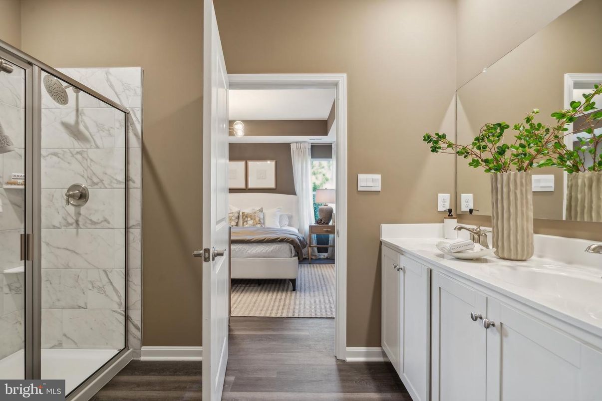 Bathroom, Bedroom, Dual Sink Vanities, Glass Shower, Interior, Marble Walls, Wood Texture Flooring
