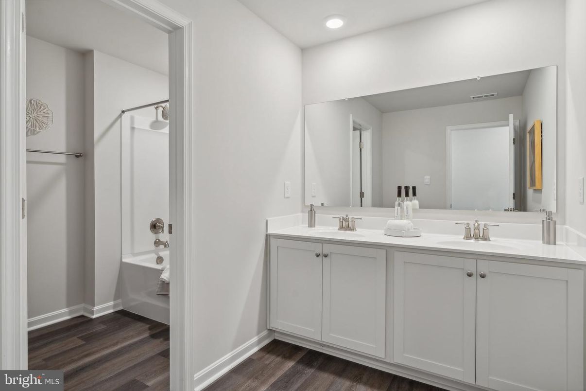 Bathroom, Dual Sink Vanities, Interior, Recessed Lighting, Wood Texture Flooring
