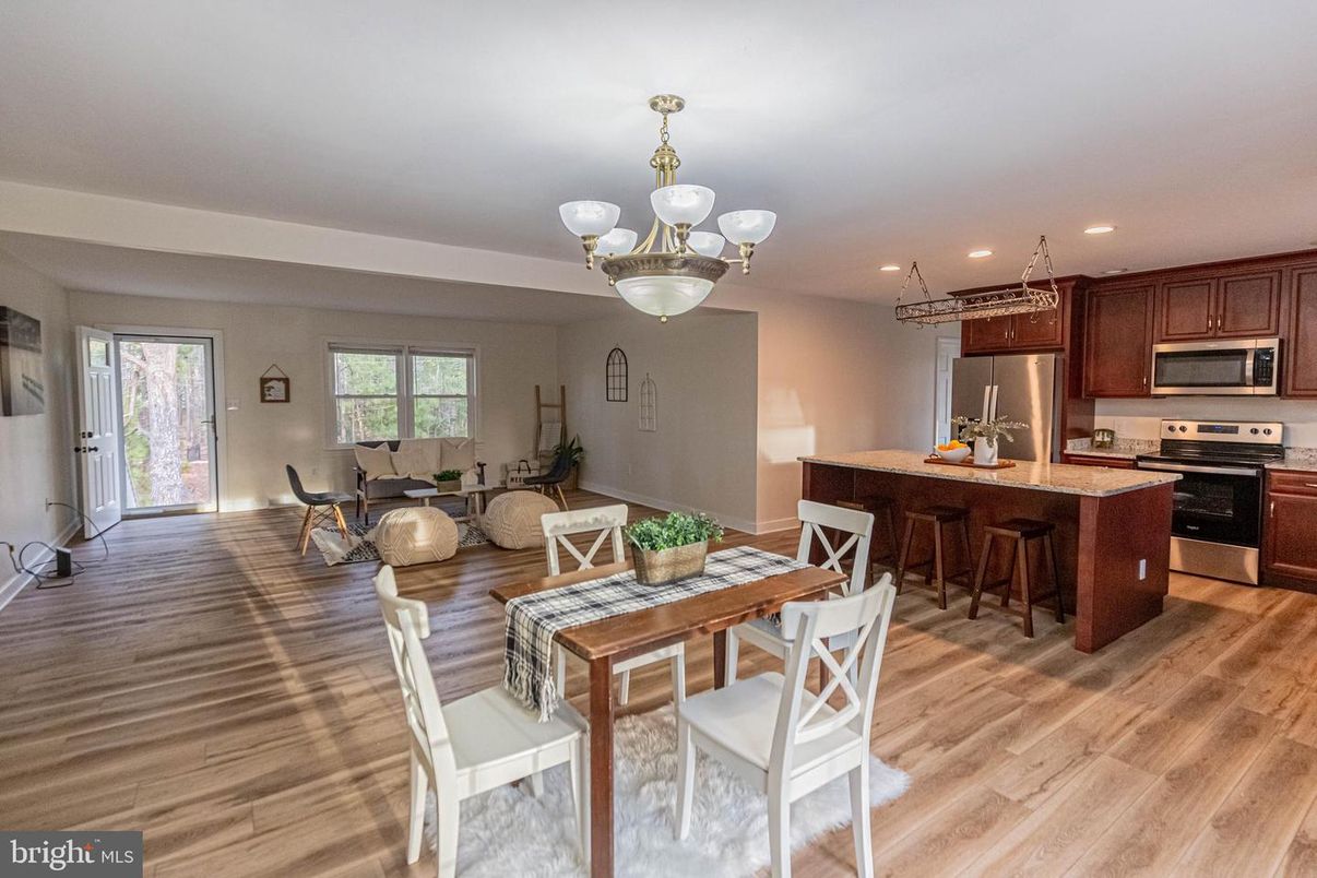 Chandelier, Dining room, Interior, Kitchen, Living room, Recessed Lighting, Stainless Steel Appliances, Wood Texture Flooring