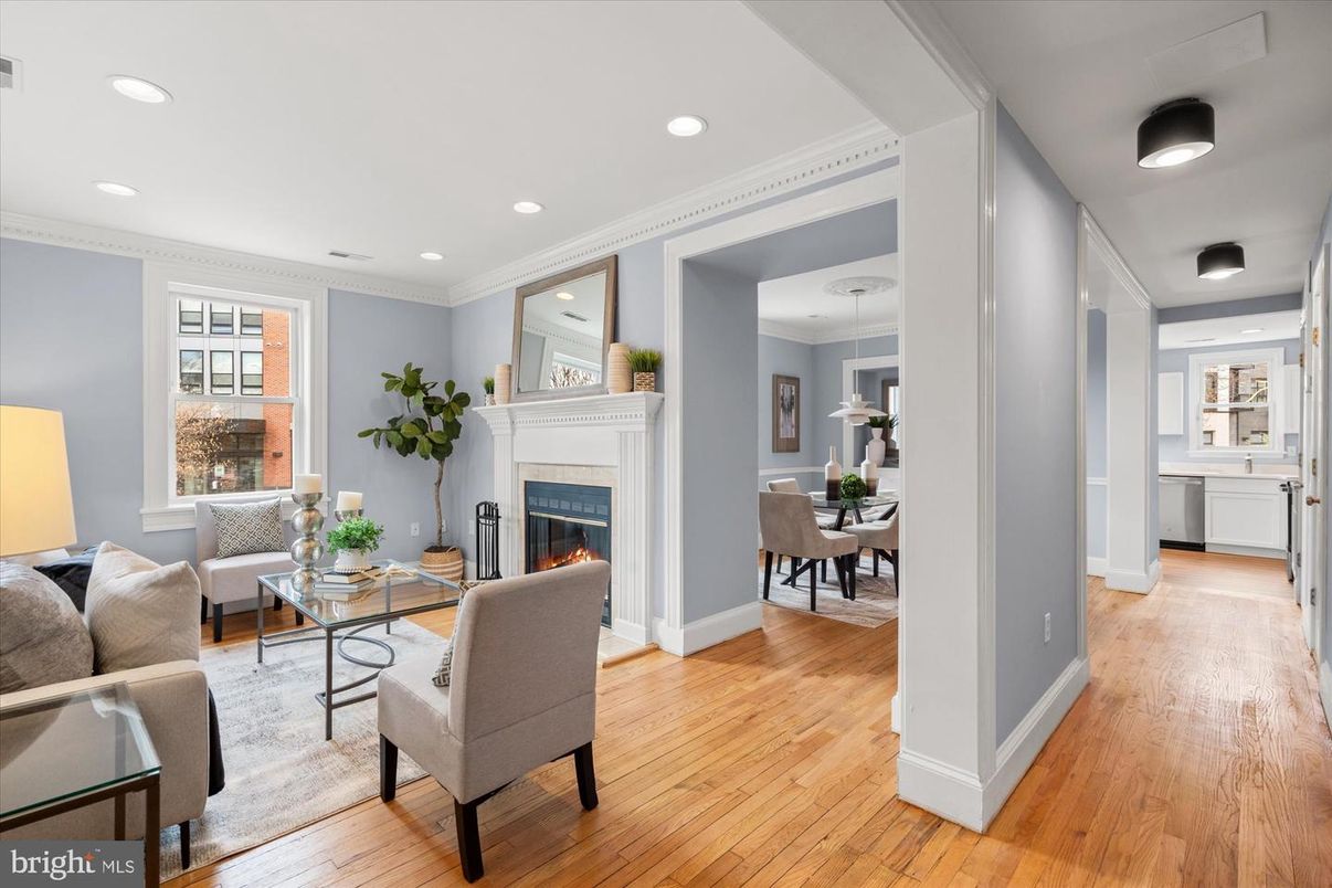 Dining room, Fireplace, Interior, Living room, Pendant Lights, Recessed Lighting, Wood Texture Flooring