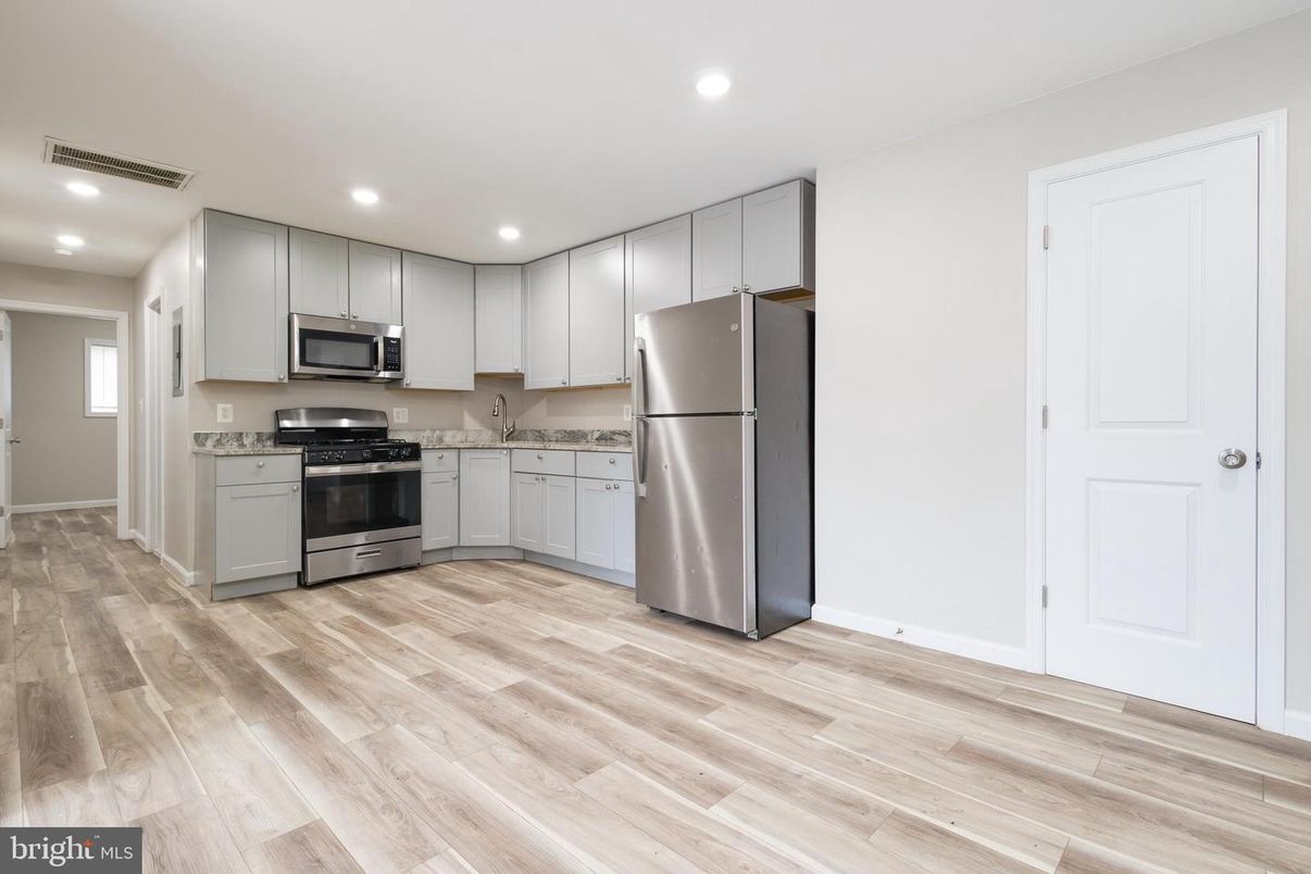 Interior, Kitchen, Recessed Lighting, Stainless Steel Appliances, Wood Texture Flooring