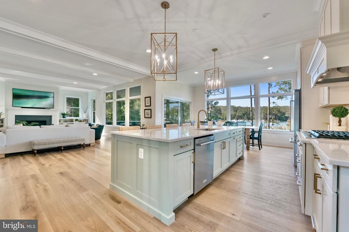 Chandelier, Dining room, Fireplace, Interior, Kitchen, Living room, Pendant Lights, Recessed Lighting, Wood Texture Flooring