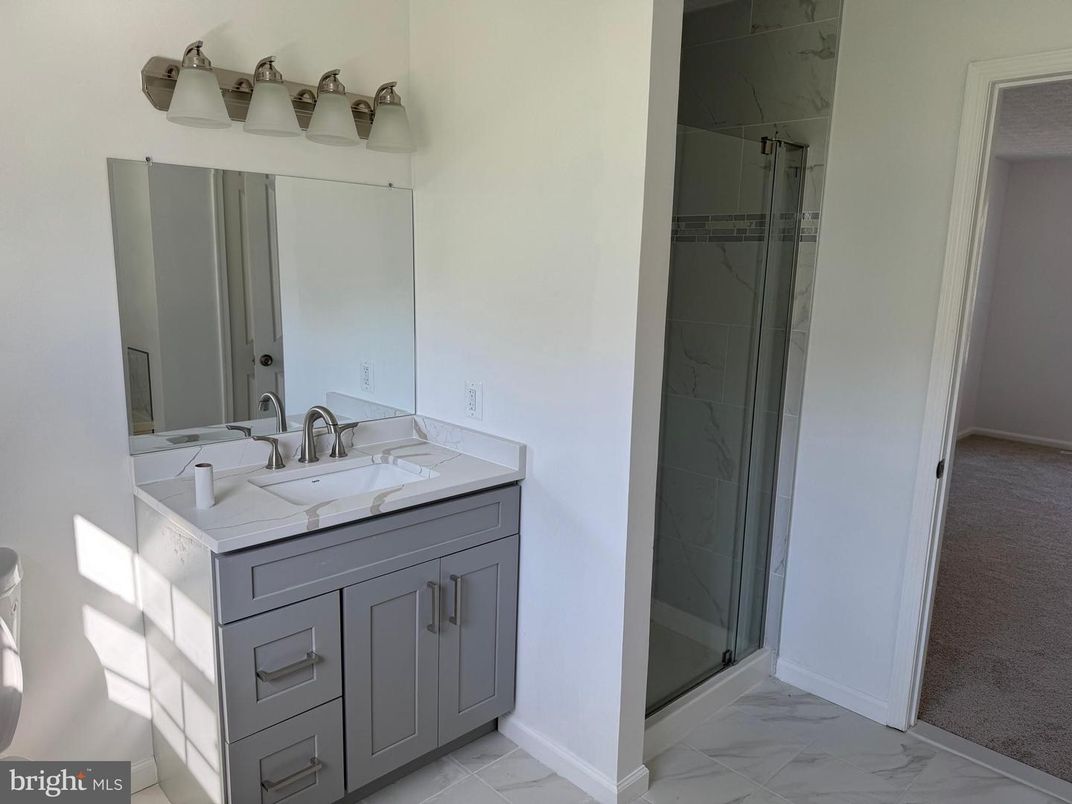 Bathroom, Dual Sink Vanities, Glass Shower, Interior, Marble, Marble Walls