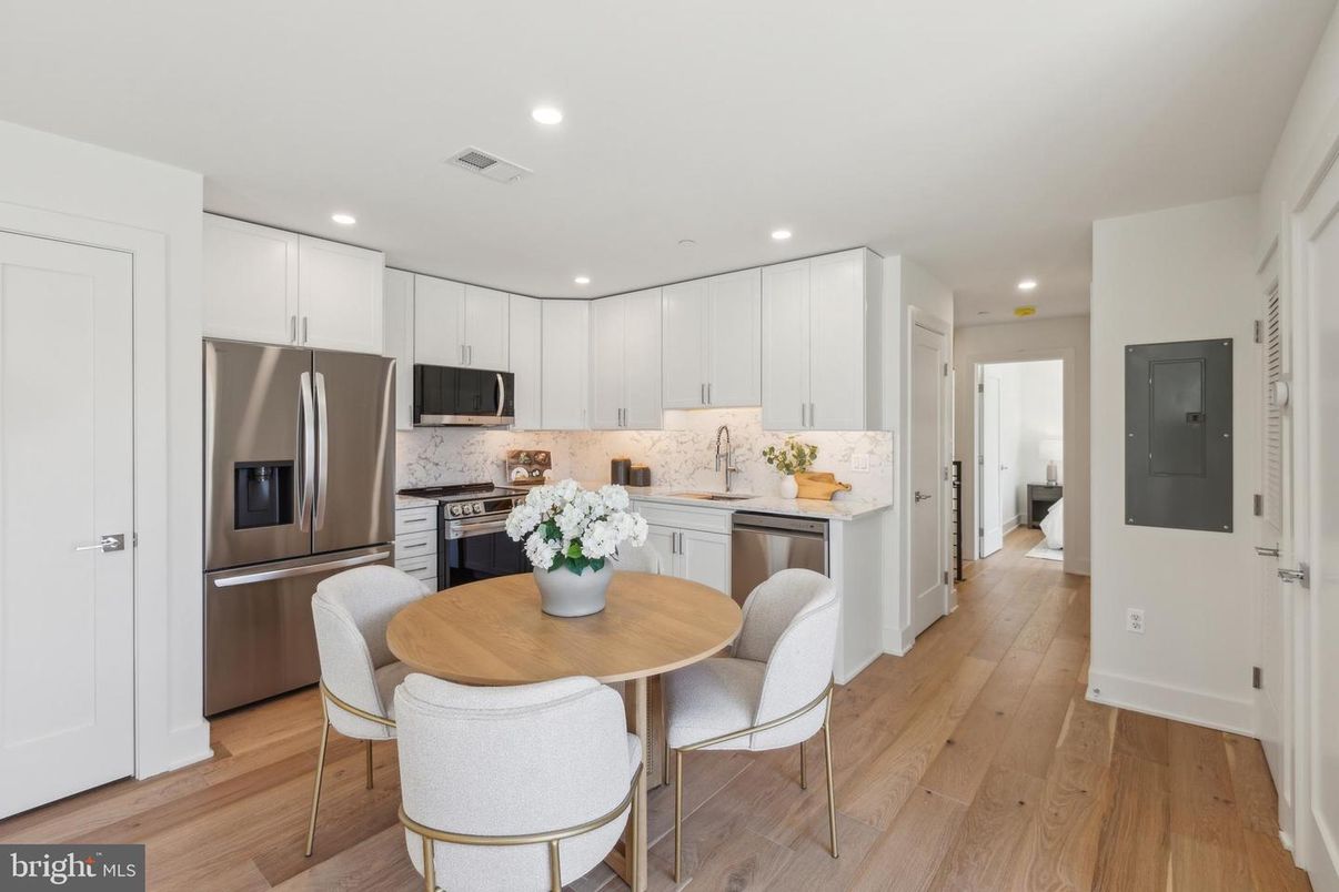 Dining room, Interior, Kitchen, Recessed Lighting, Stainless Steel Appliances, Wood Texture Flooring