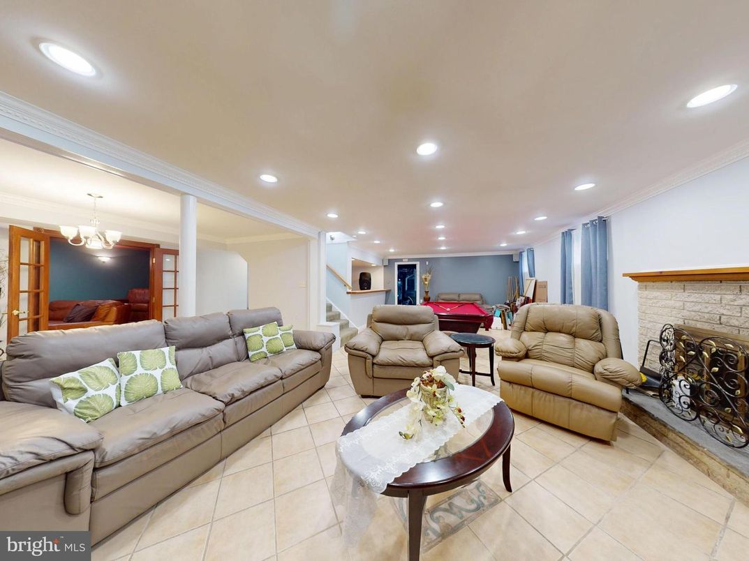 Billiard Table, Chandelier, Fireplace, Game Room, Interior, Living room, Recessed Lighting, Stone Walls