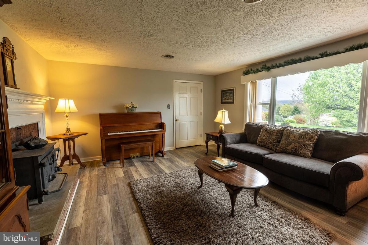 Fireplace, Interior, Living room, Piano, Wood Texture Flooring