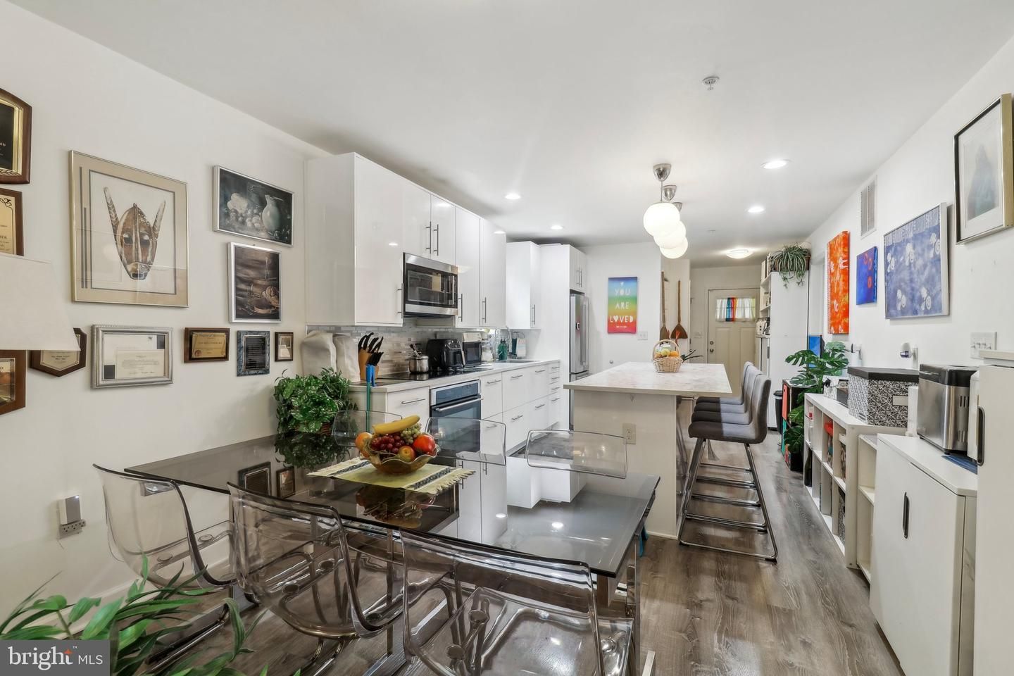 Dining room, Interior, Kitchen, Pendant Lights, Recessed Lighting, Stainless Steel Appliances, Wood Texture Flooring