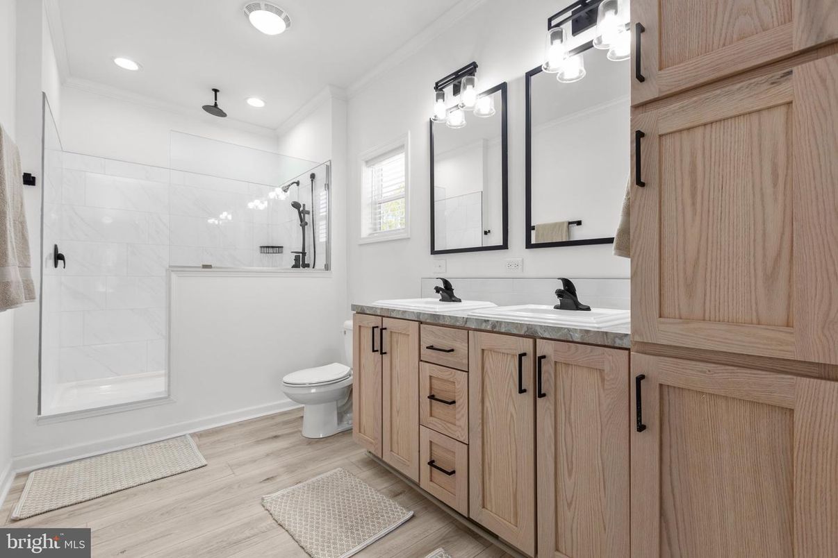 Bathroom, Dual Sink Vanities, Interior, Recessed Lighting, Wood Texture Flooring
