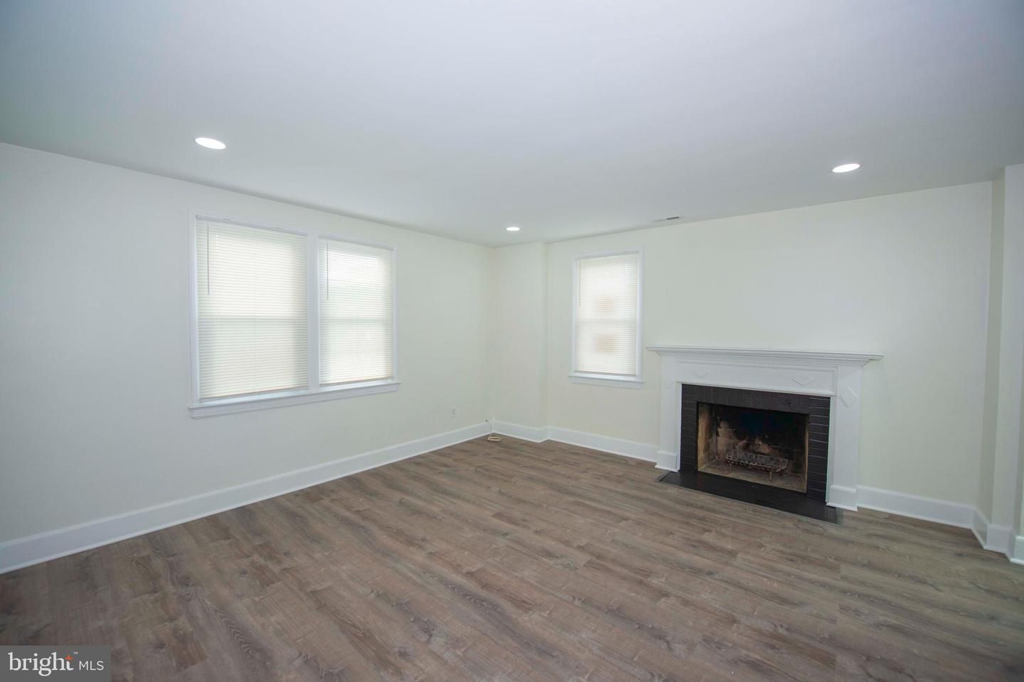 Empty room, Fireplace, Interior, Recessed Lighting, Wood Texture Flooring