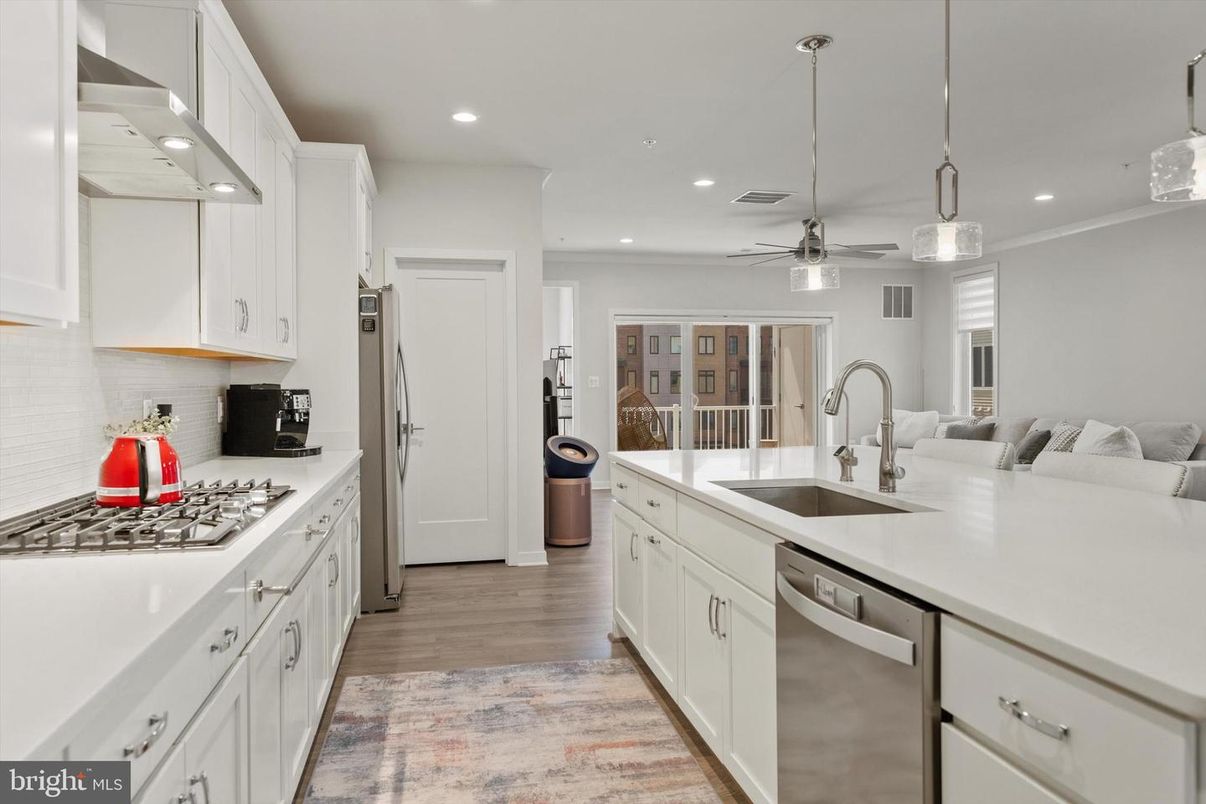 Interior, Kitchen, Pendant Lights, Recessed Lighting, Stainless Steel Appliances, Wood Texture Flooring