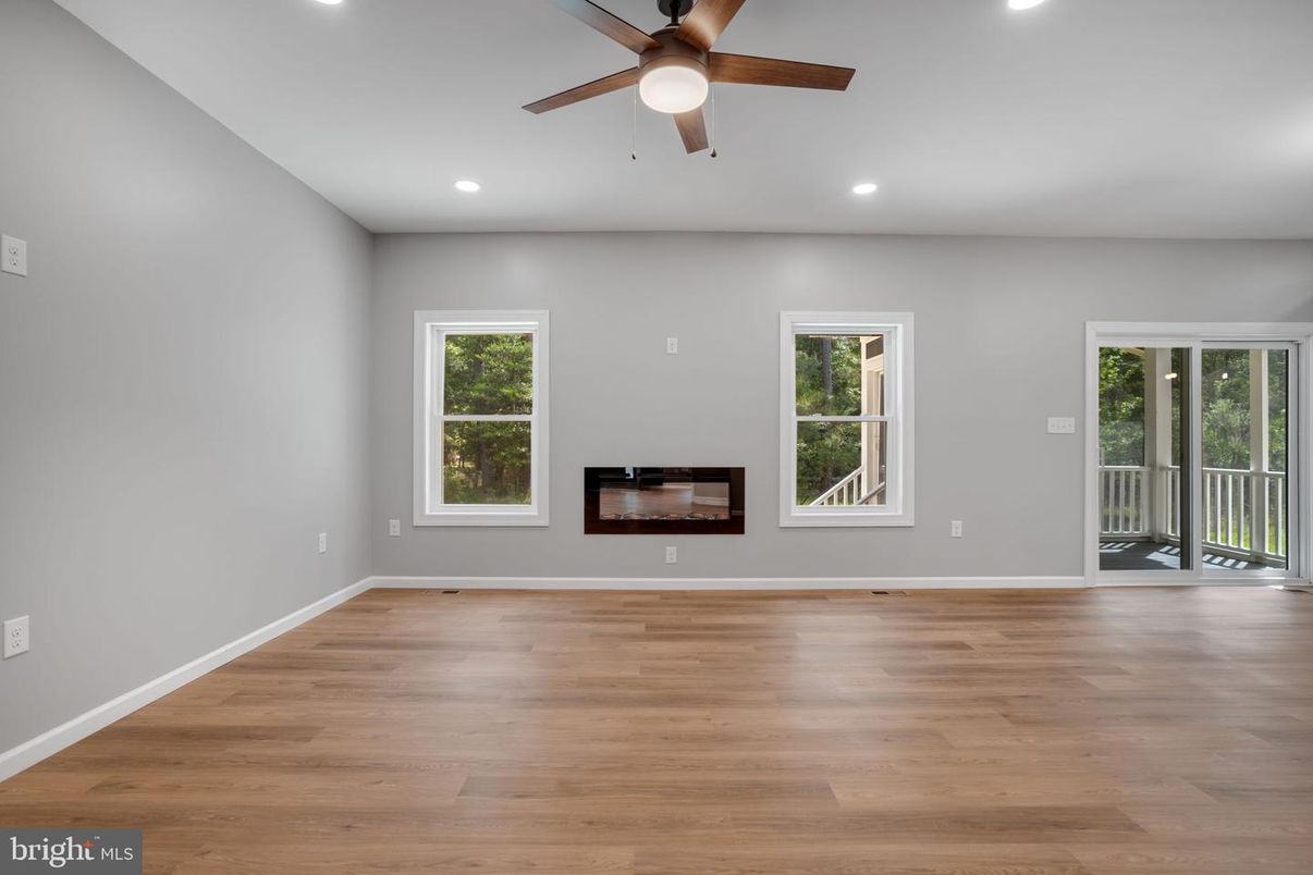 Empty room, Fireplace, Interior, Recessed Lighting, Wood Texture Flooring