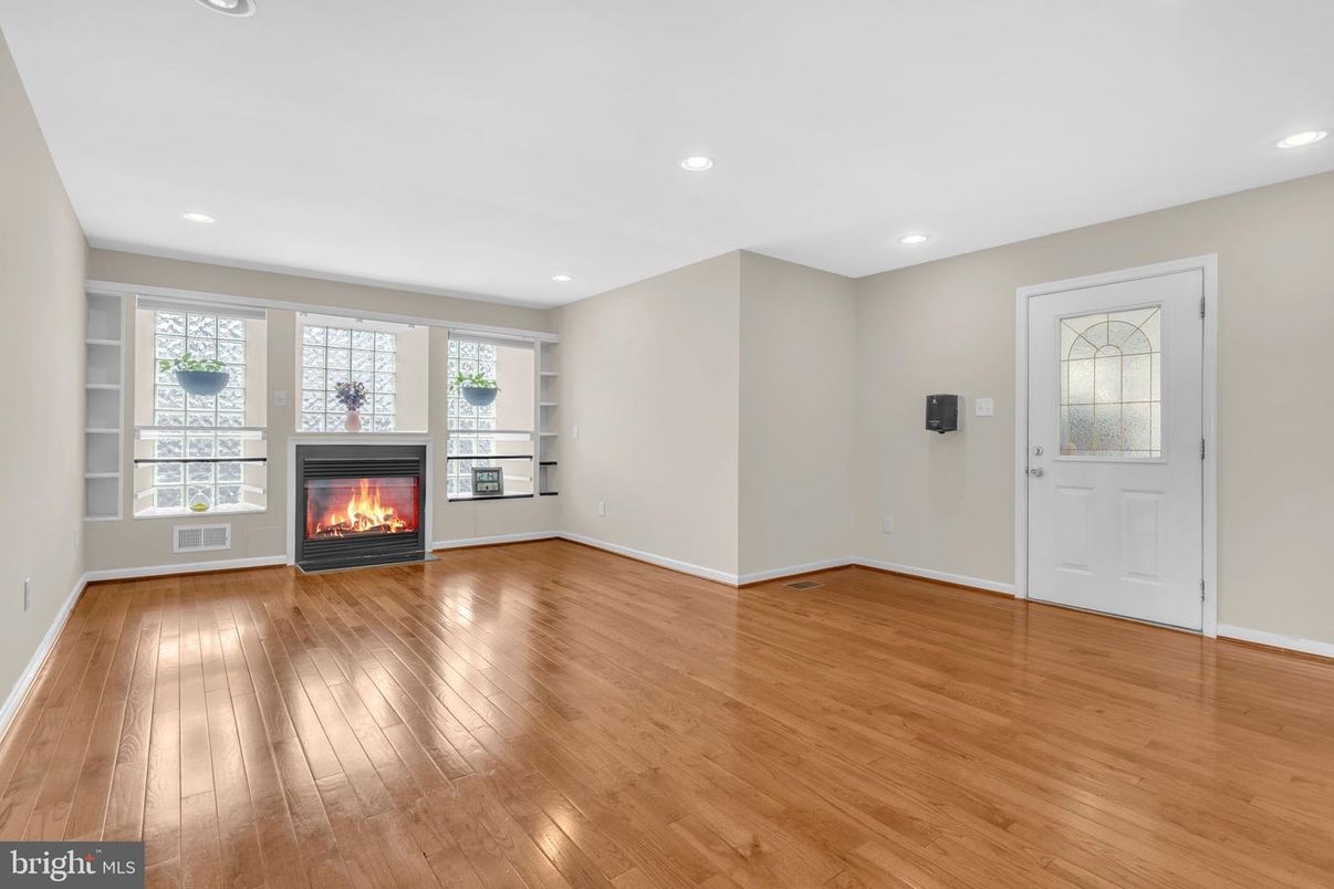 Empty room, Fireplace, Interior, Recessed Lighting, Wood Texture Flooring