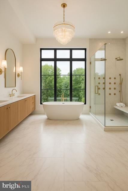 Bathroom, Chandelier, Dual Sink Vanities, Free Standing Baths, Glass Shower, Interior, Marble, Marble Walls, Recessed Lighting