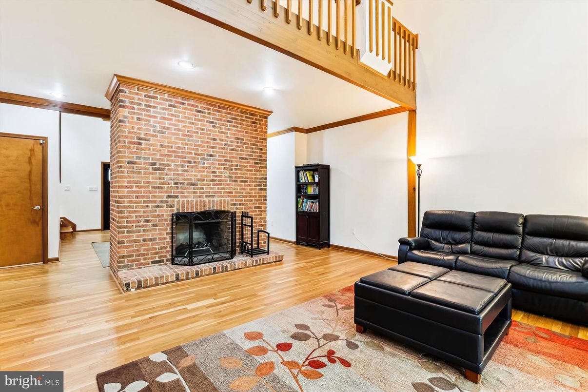 Fireplace, Interior, Recessed Lighting, Stone Walls, Wood Texture Flooring
