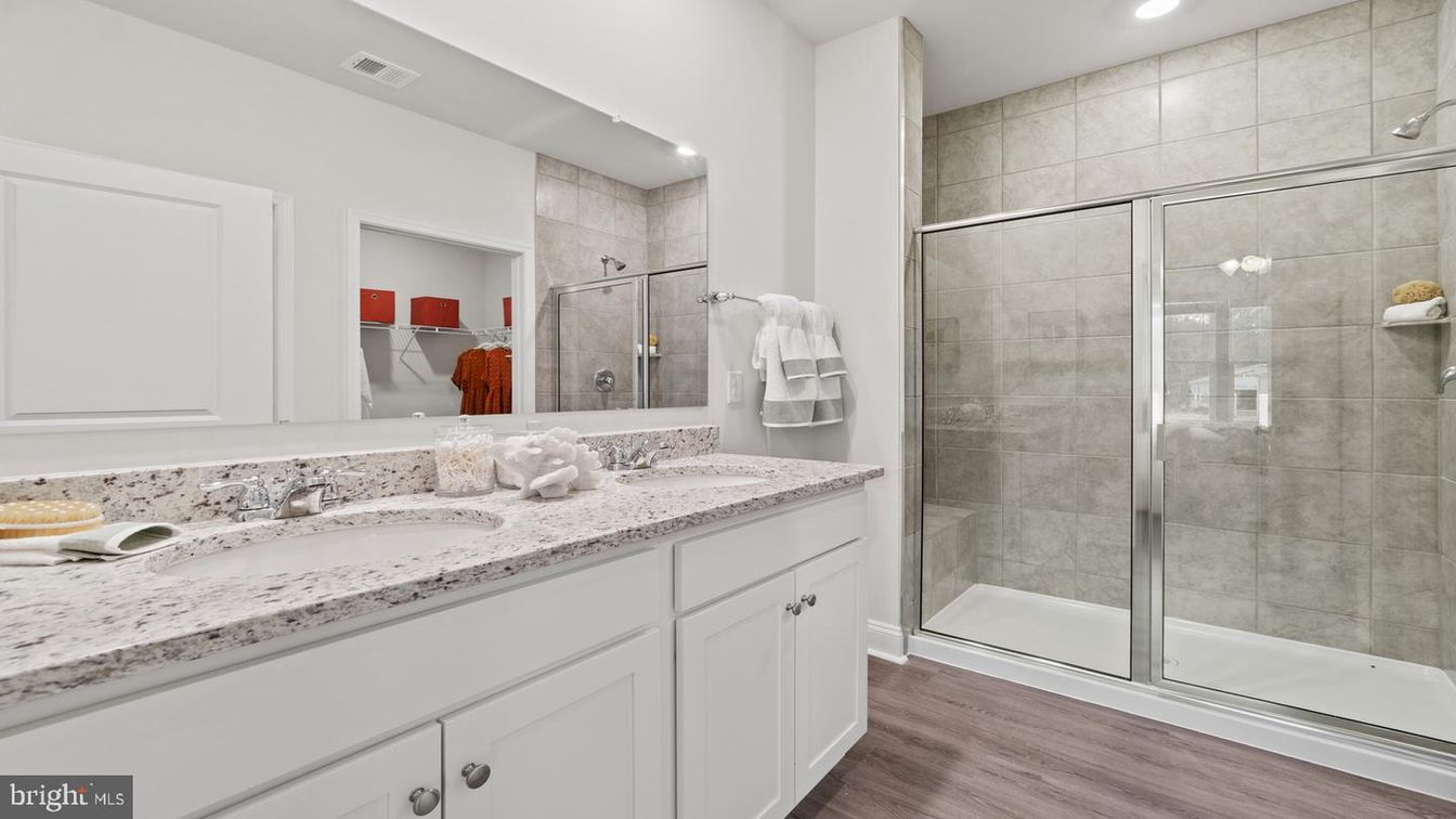 Bathroom, Dual Sink Vanities, Glass Shower, Interior, Recessed Lighting, Wood Texture Flooring