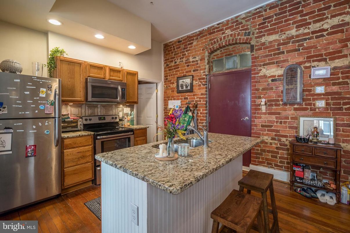 Interior, Kitchen, Recessed Lighting, Stainless Steel Appliances, Stone Walls, Wood Texture Flooring