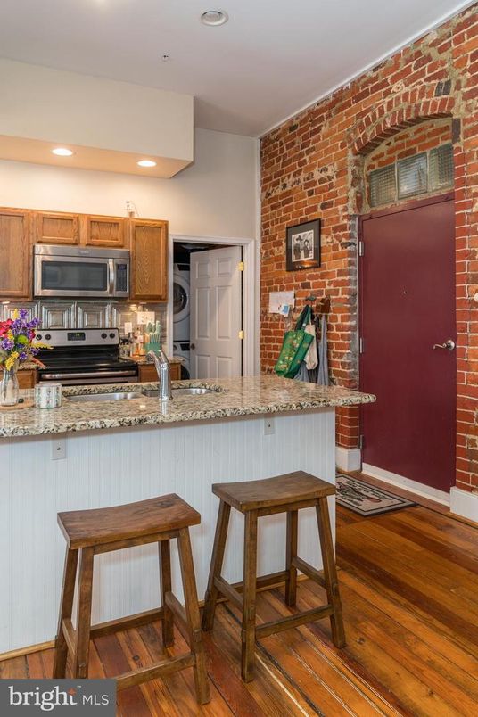 Interior, Kitchen, Recessed Lighting, Stainless Steel Appliances, Stone Walls, Wood Texture Flooring