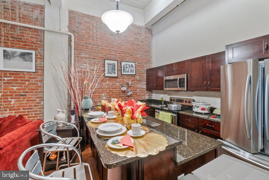 Interior, Kitchen, Pendant Lights, Stainless Steel Appliances, Stone Walls