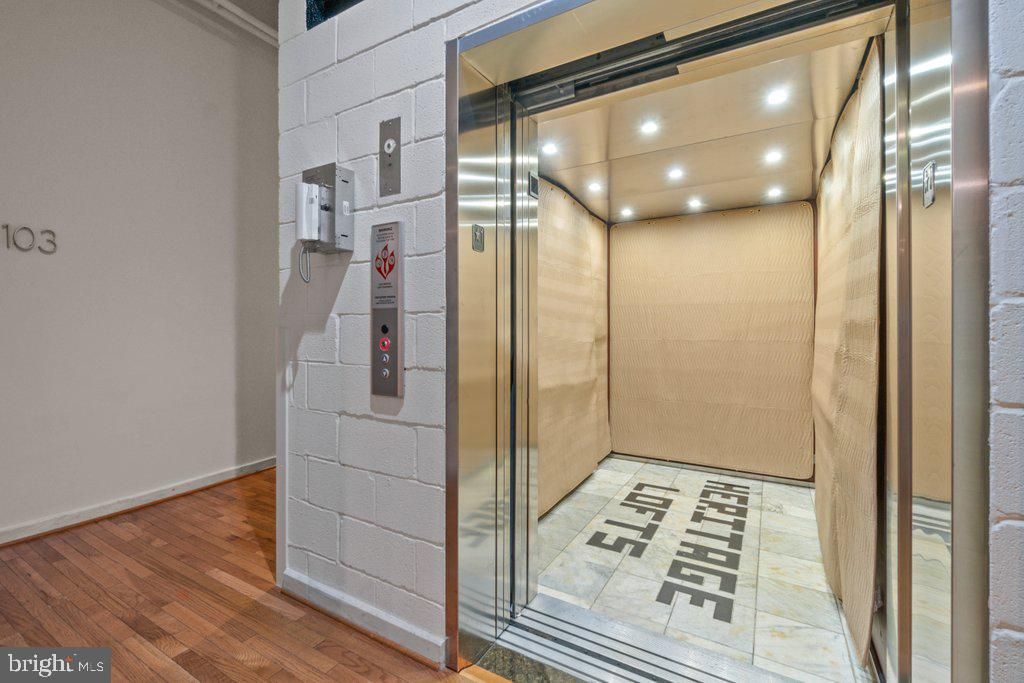 Elevator, Interior, Recessed Lighting, Wood Texture Flooring