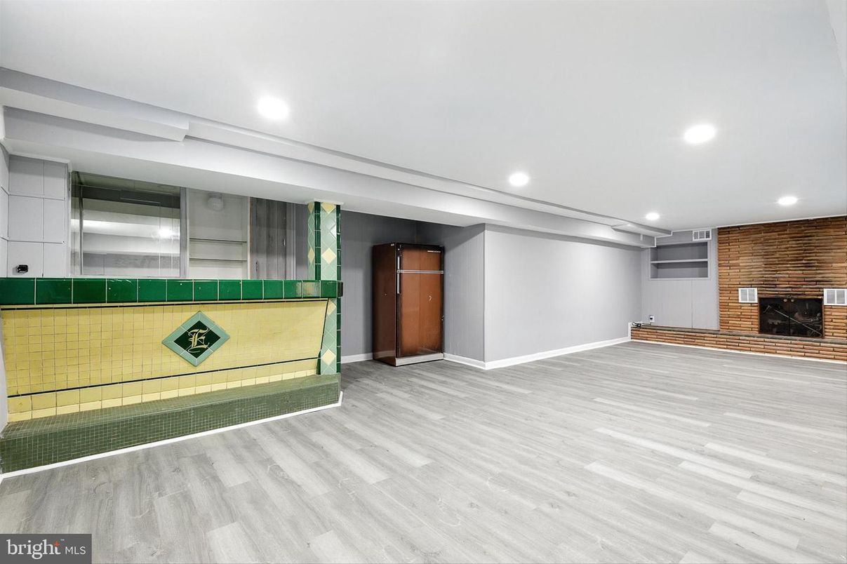 Empty room, Fireplace, Interior, Recessed Lighting, Stone Walls, Wood Texture Flooring