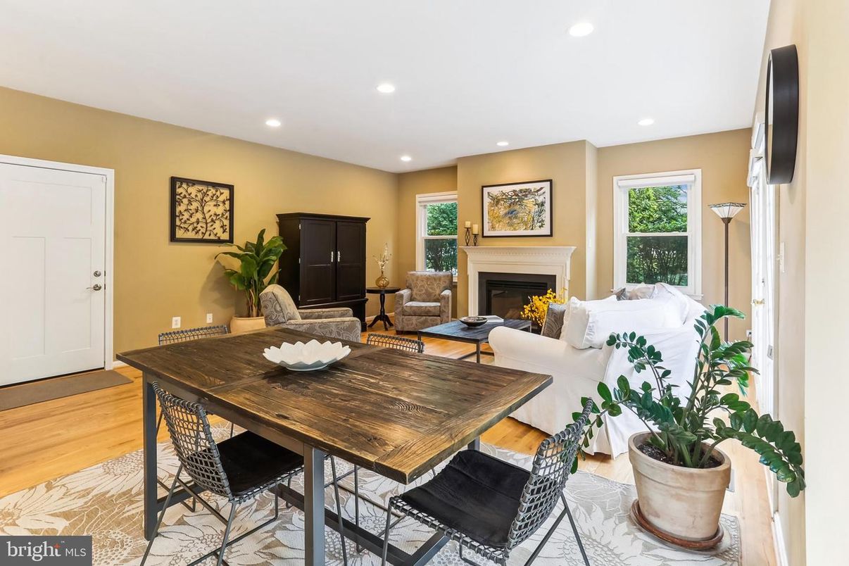 Dining room, Fireplace, Interior, Living room, Recessed Lighting, Wood Texture Flooring