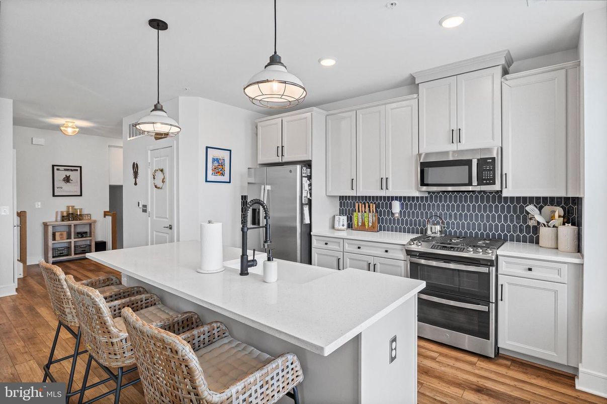 Interior, Kitchen, Pendant Lights, Recessed Lighting, Stainless Steel Appliances, Wood Texture Flooring