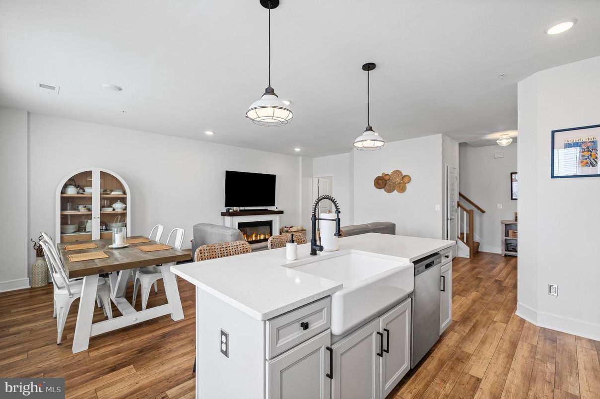 Dining room, Fireplace, Interior, Kitchen, Pendant Lights, Recessed Lighting, Wood Texture Flooring