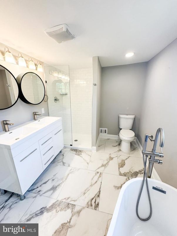 Bathroom, Dual Sink Vanities, Free Standing Baths, Glass Shower, Interior, Marble, Recessed Lighting