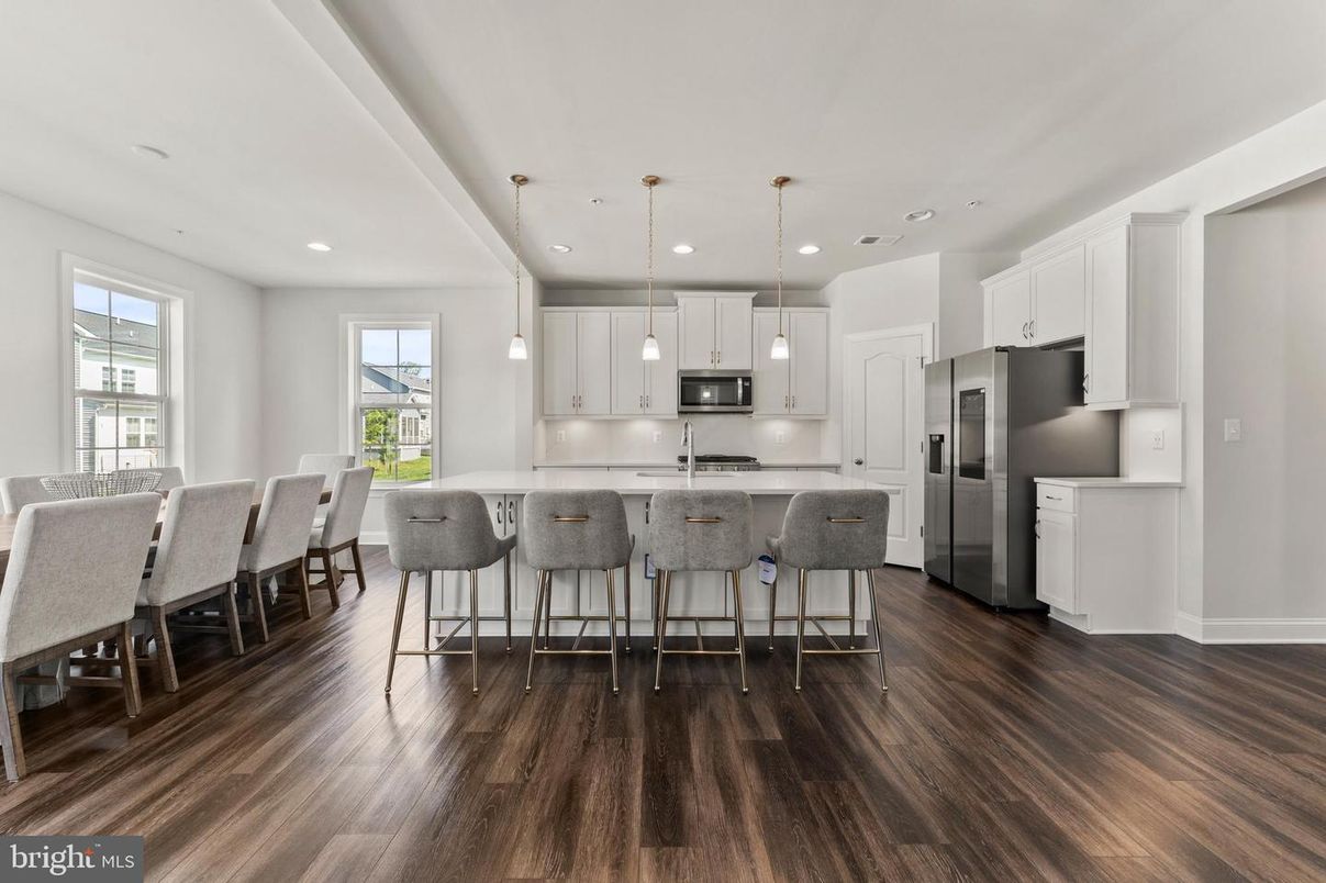 Dining room, Interior, Kitchen, Pendant Lights, Recessed Lighting, Stainless Steel Appliances, Wood Texture Flooring