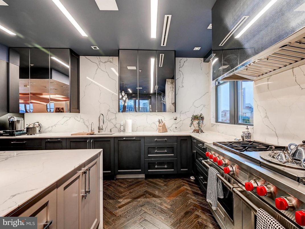 Interior, Kitchen, Marble Walls, Recessed Lighting, Stainless Steel Appliances, Wood Texture Flooring