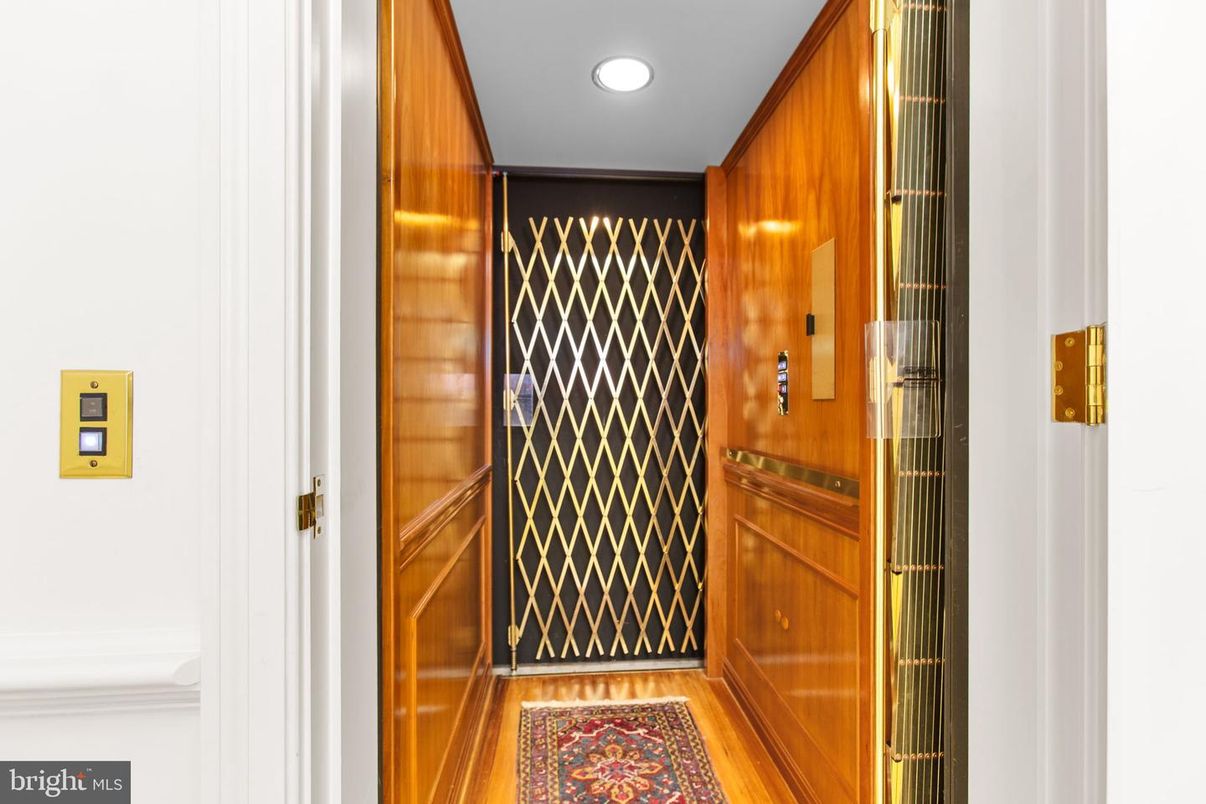 Elevator, Interior, Recessed Lighting, Wood Texture Flooring, Wooden Walls