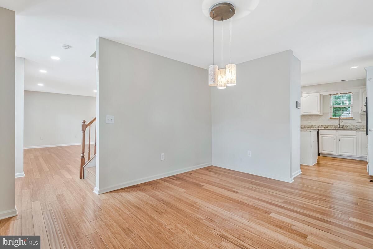 Empty room, Interior, Kitchen, Pendant Lights, Recessed Lighting, Wood Texture Flooring