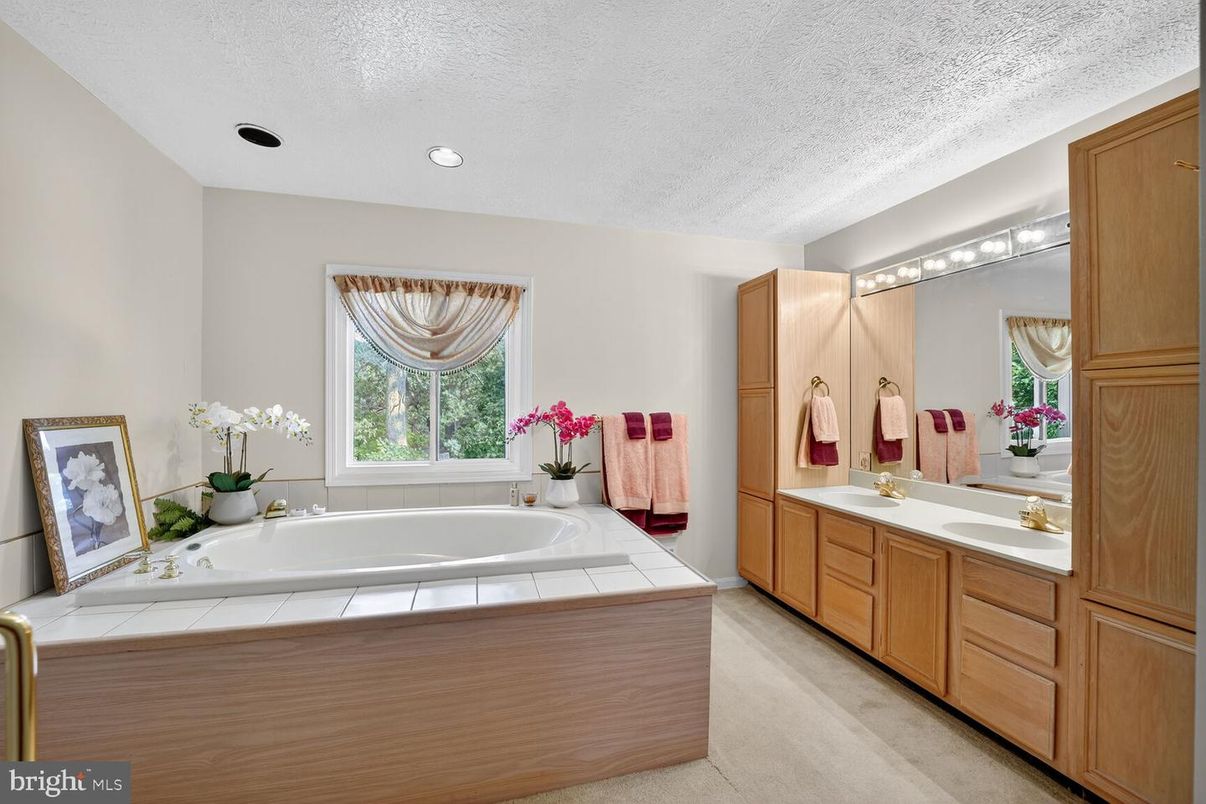 Bathroom, Dual Sink Vanities, Interior, Recessed Lighting, Tile Countertops