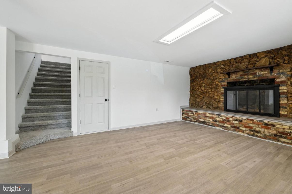 Empty room, Fireplace, Interior, Stone Walls, Wood Texture Flooring