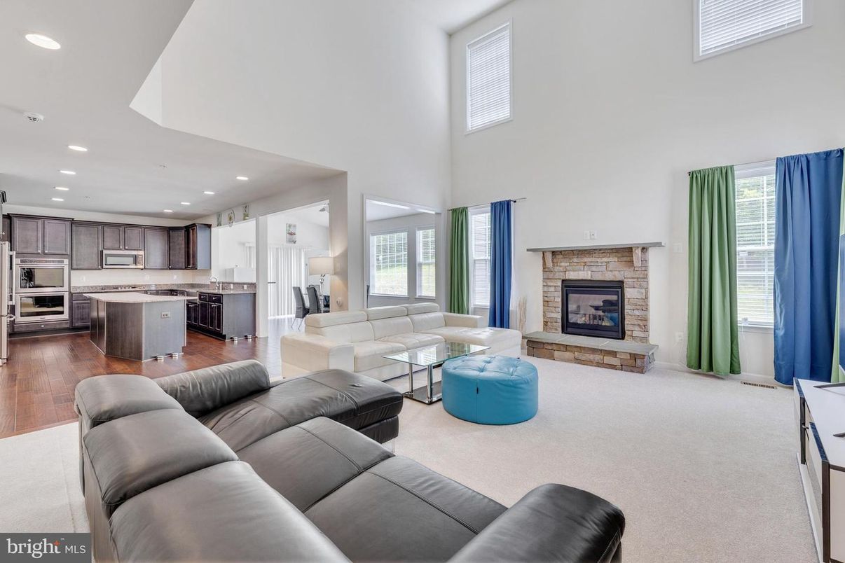 Fireplace, Interior, Kitchen, Living room, Recessed Lighting, Stainless Steel Appliances, Wood Texture Flooring