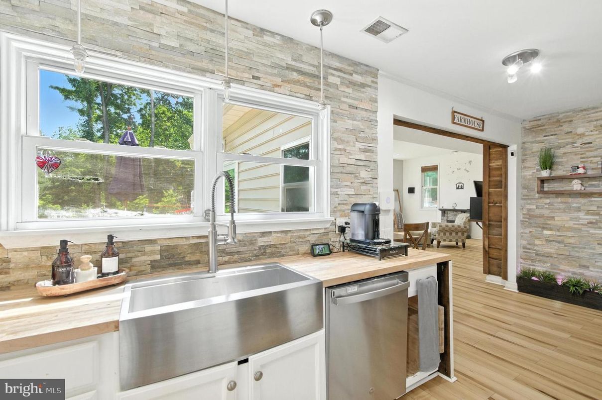 Interior, Kitchen, Pendant Lights, Stainless Steel Appliances, Stone Walls, Wood Texture Flooring