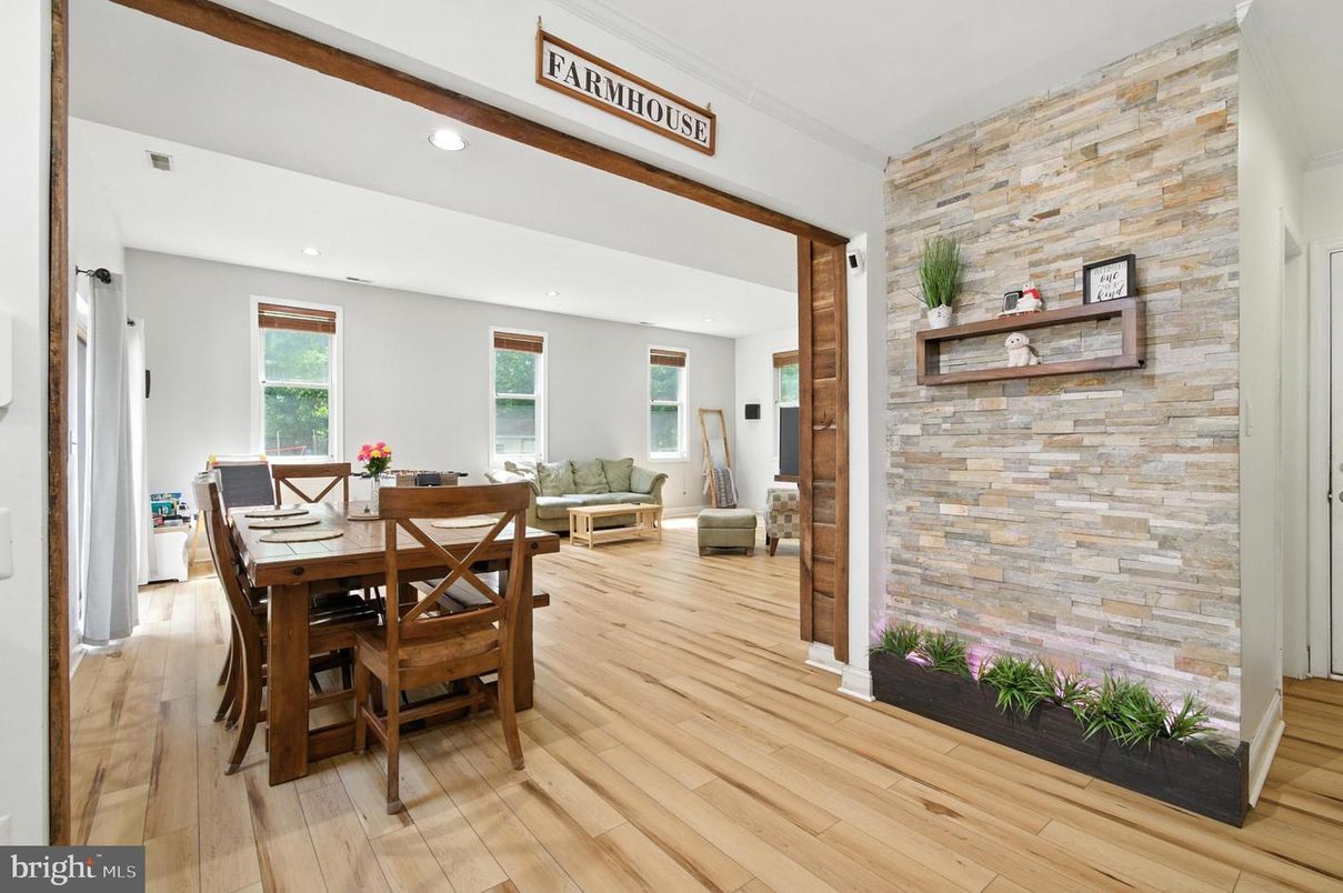 Dining room, Interior, Living room, Recessed Lighting, Stone Walls, Wood Texture Flooring, Wooden Walls