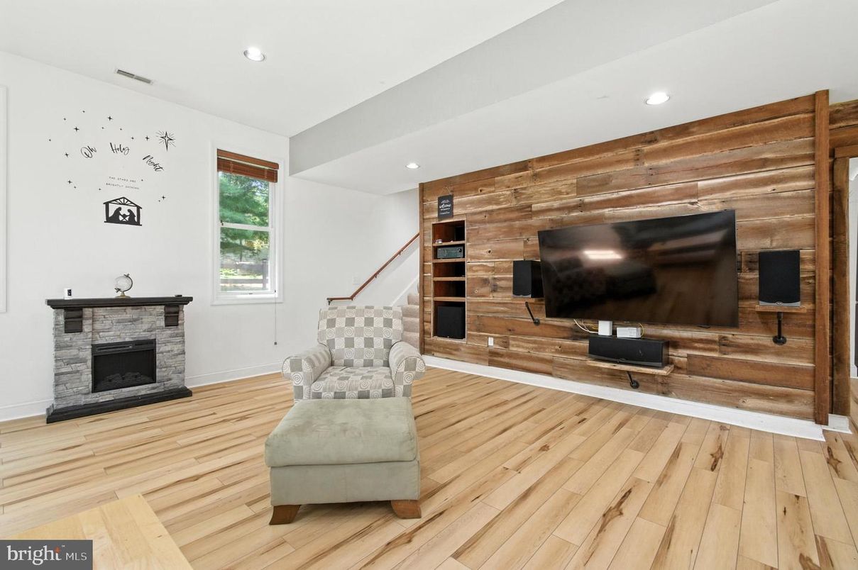 Fireplace, Interior, Recessed Lighting, Wood Texture Flooring, Wooden Walls
