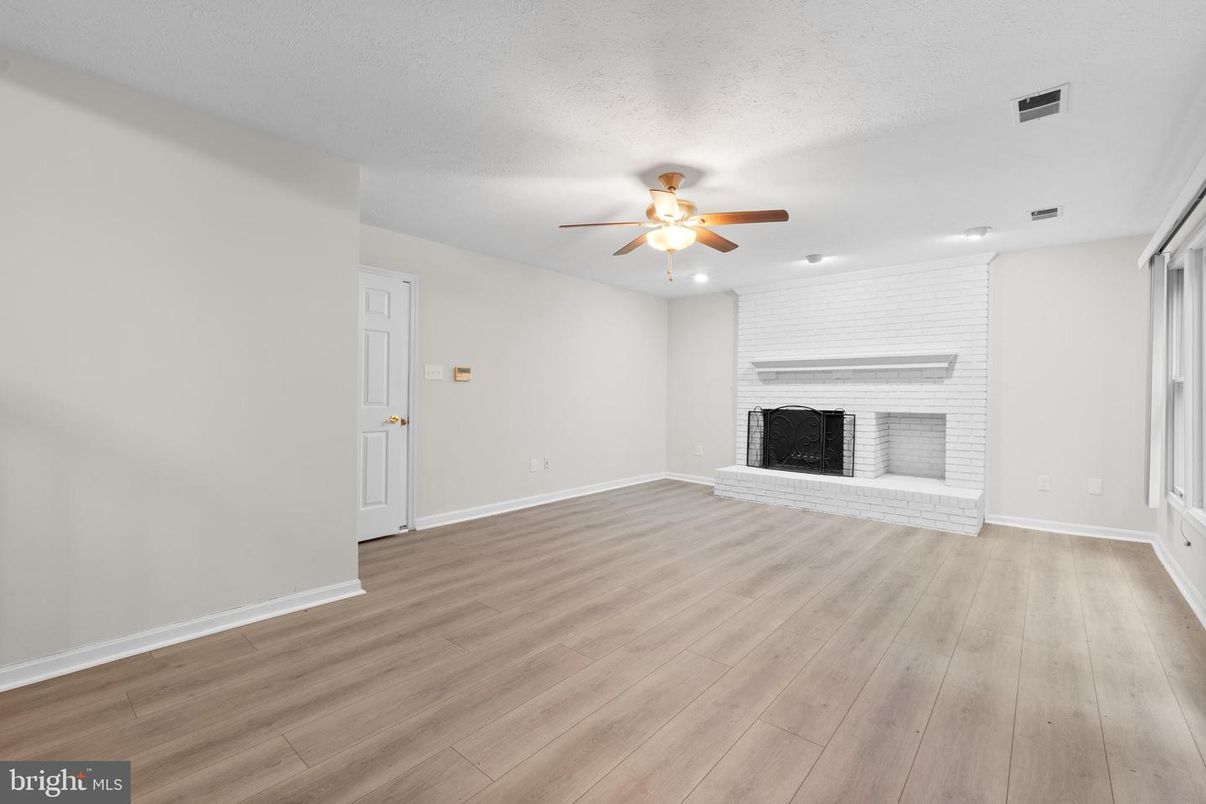 Empty room, Fireplace, Interior, Recessed Lighting, Wood Texture Flooring