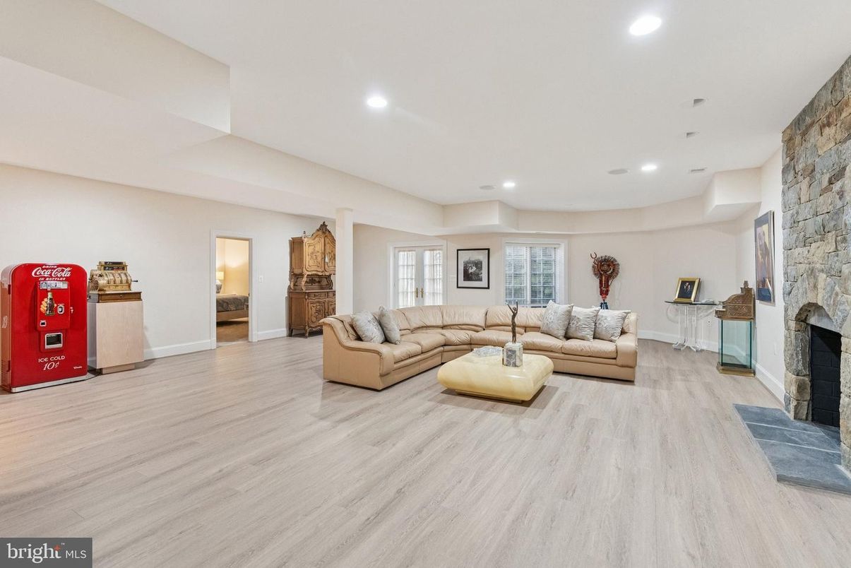 Fireplace, Interior, Living room, Recessed Lighting, Stone Walls, Wood Texture Flooring