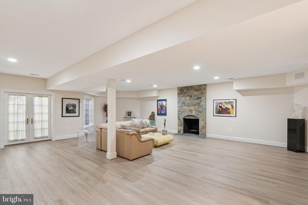 Fireplace, Interior, Living room, Recessed Lighting, Stone Walls, Wood Texture Flooring