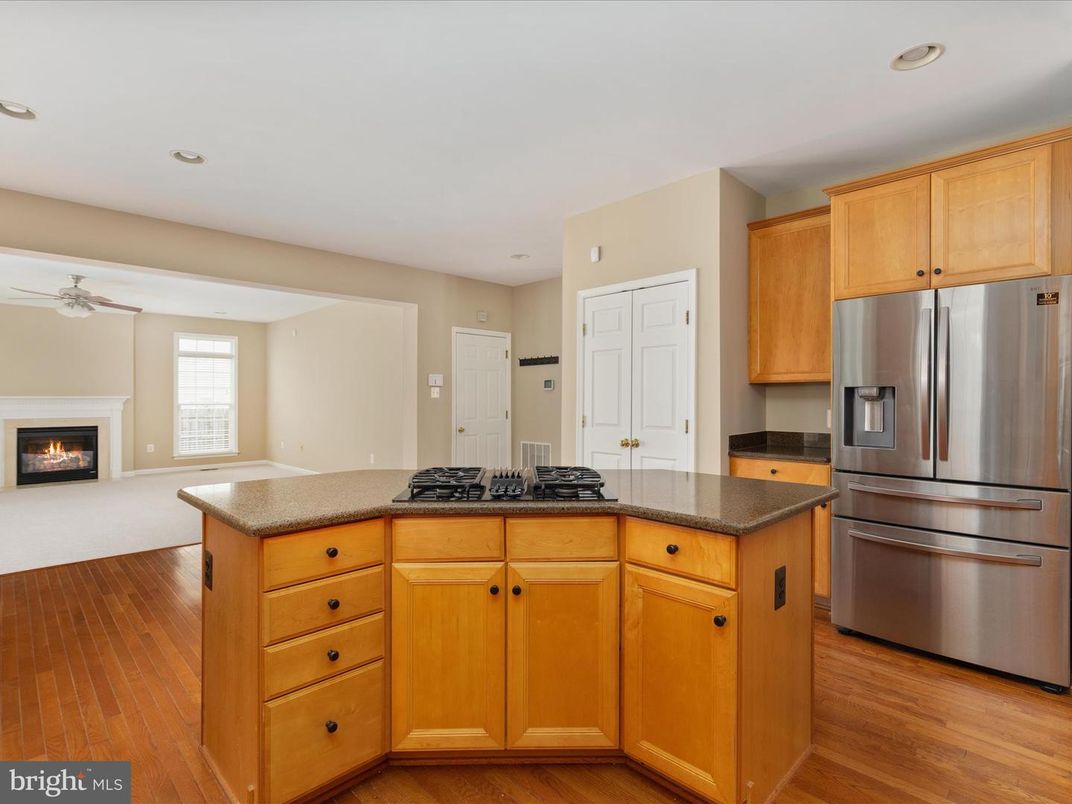 Fireplace, Interior, Kitchen, Recessed Lighting, Wood Texture Flooring