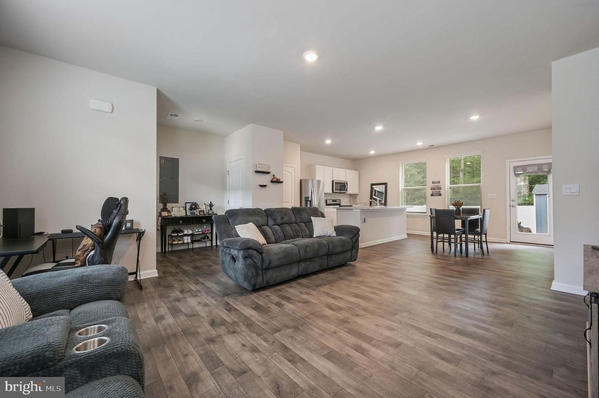 Dining room, Interior, Kitchen, Living room, Recessed Lighting, Stainless Steel Appliances, Wood Texture Flooring